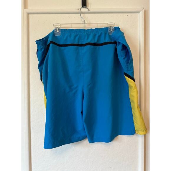 Under Armour HeatGear Men’s Swim Shorts 2XL Blue Yellow Mesh Liner Athletic - Picture 2 of 5